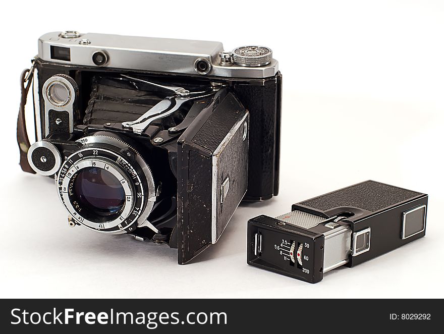 Two old photo cameras on white background