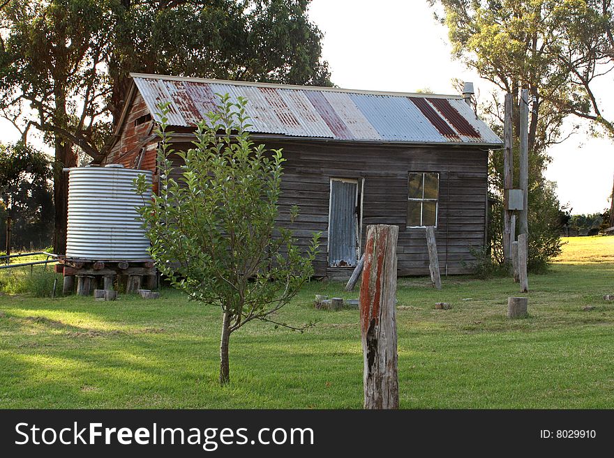 Rusty old house in farmyard. Rusty old house in farmyard