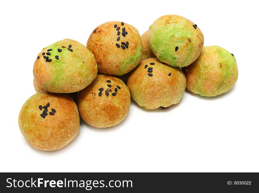 A pile of dragon ball pastry isolated on white background.