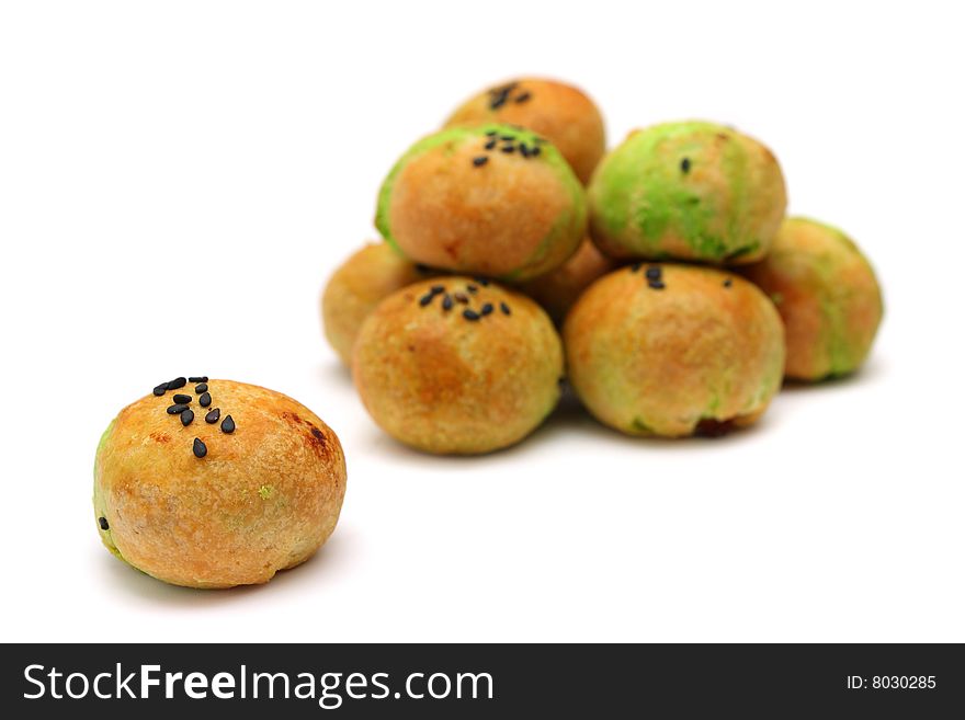 A pile of dragon ball pastry isolated on white background.