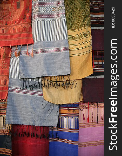 Traditional Thai motley scarfs selling on the market. Traditional Thai motley scarfs selling on the market