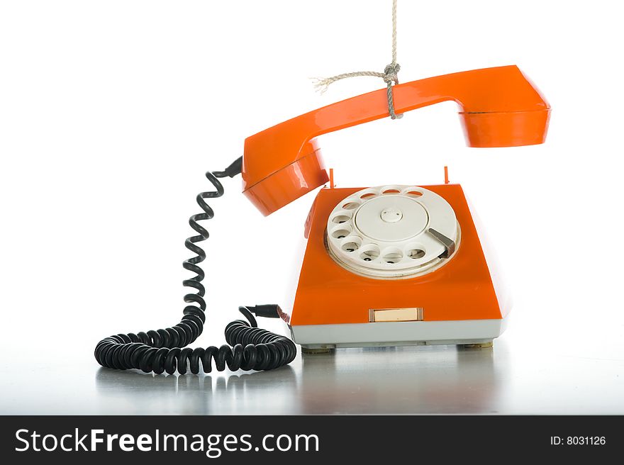 Someone pulling rope with orange phone. Close-up. Isolated over white background