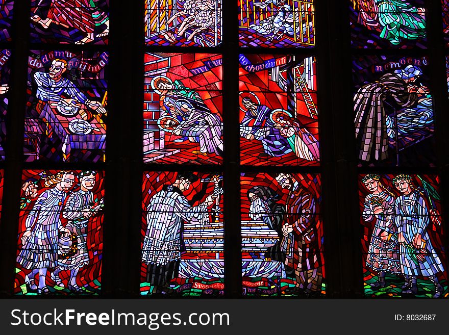 Colorful stained-glass window in St.Vitus cathedral in Czech capital Prague