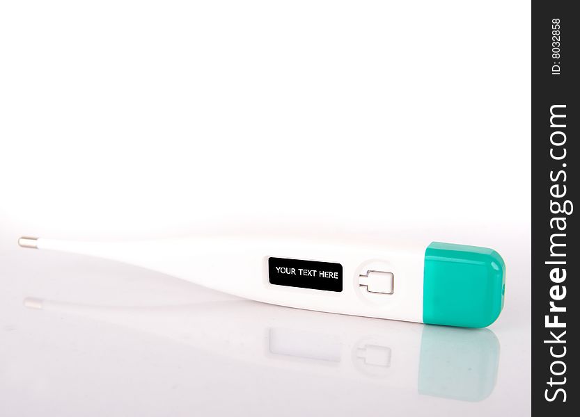 A digital thermometer - with copyspace in the display - isolated over gradient white. A digital thermometer - with copyspace in the display - isolated over gradient white.