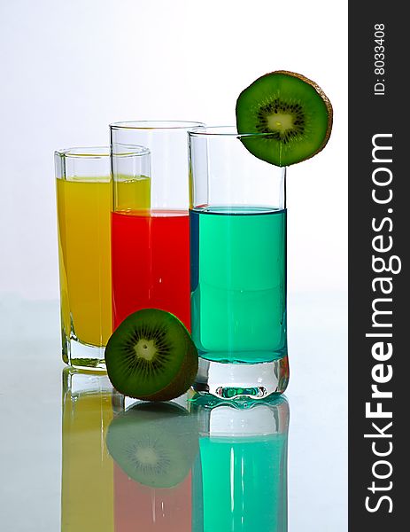 Cocktail and juice isolated on white