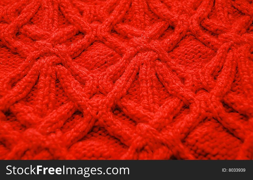 Knitted texture of red color. Knitted texture of red color