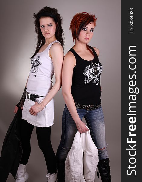 Two young models posing in the studio. Two young models posing in the studio