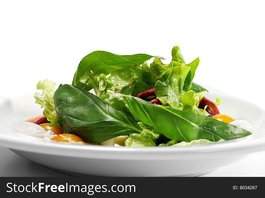 Salad - Smoked Magret (Duck Breast) with Red Chaud-Froid Sauce. Comprises Tomato and Vegetable Leaf. Isolated on White Background. Salad - Smoked Magret (Duck Breast) with Red Chaud-Froid Sauce. Comprises Tomato and Vegetable Leaf. Isolated on White Background