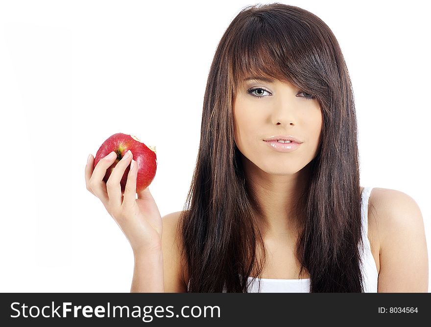Woman eating red apple.
