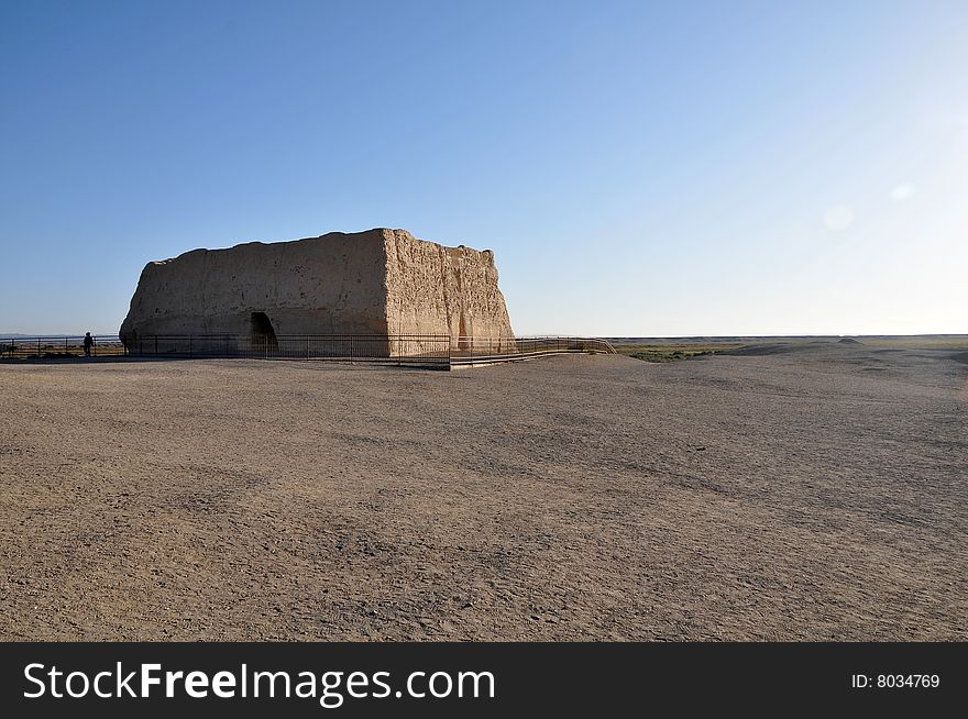 Old blockhouse stands lonely in a boundless Gobi desert. Old blockhouse stands lonely in a boundless Gobi desert.