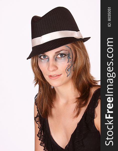 Portrait of girl with blue fantacy makeup and black hat. Portrait of girl with blue fantacy makeup and black hat
