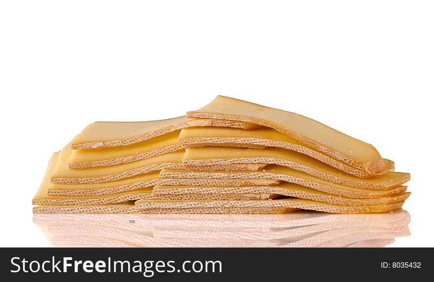 Stack of chopped cheese isolated on white background