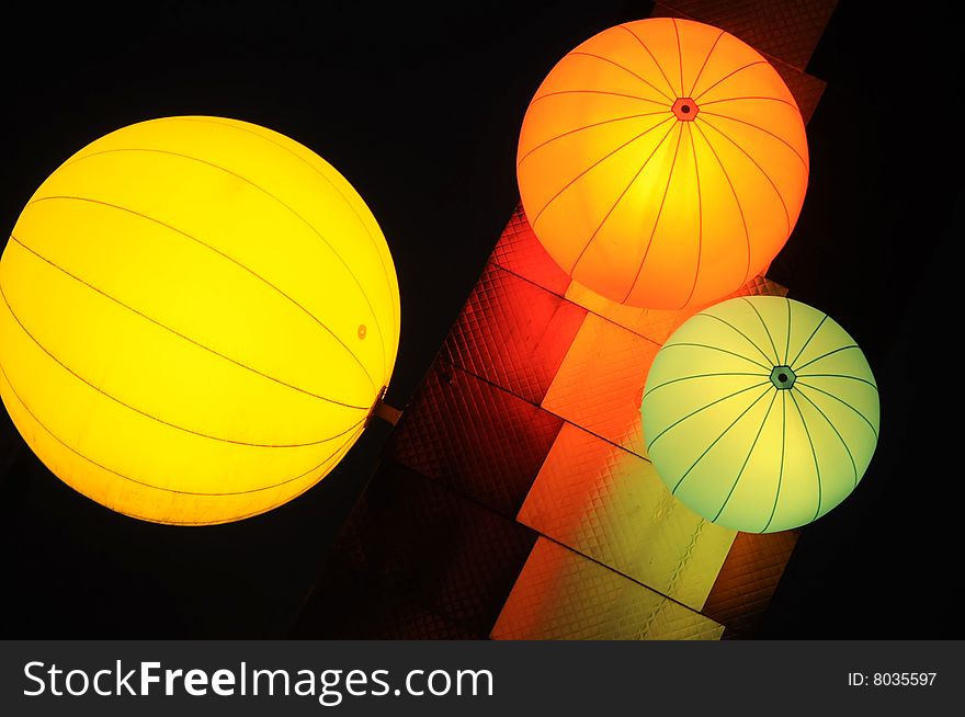 Illuminated globes that look like fruit. Illuminated globes that look like fruit