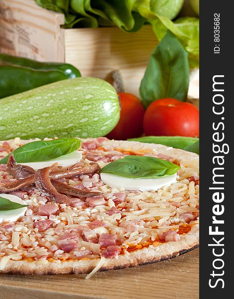 Delicious pizza with cheese and ham on decorated platter