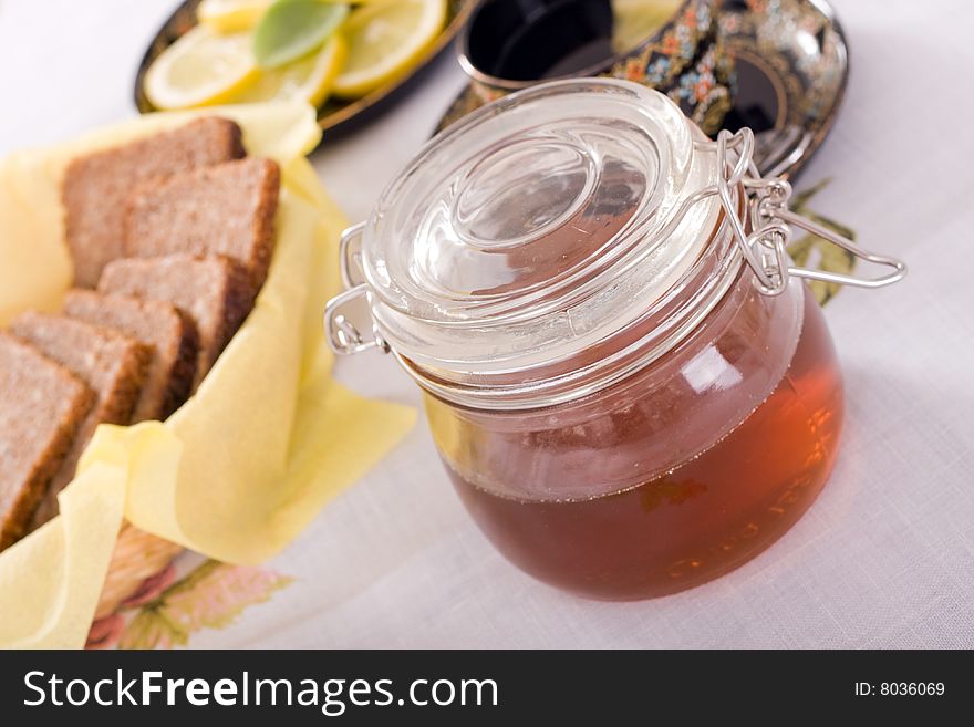 Honey, Slice citrus and cup of tea