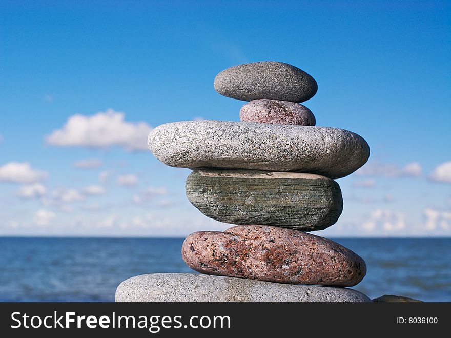 Pile of a various sea pebble on an ocean coast. Pile of a various sea pebble on an ocean coast