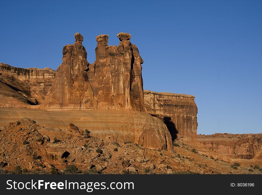 View of the red rock formations in Arches National Park with blue skyï¿½. View of the red rock formations in Arches National Park with blue skyï¿½