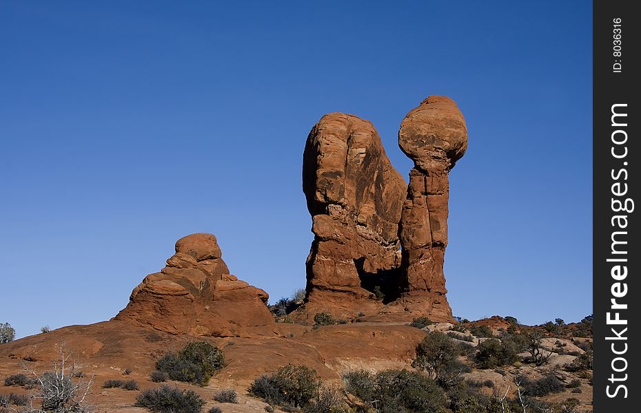 View of the red rock formations in Arches National Park with blue skyï¿½s