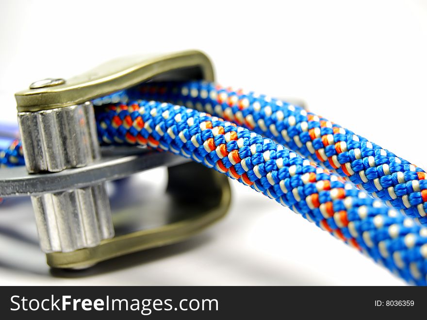 Climbing gear against white background