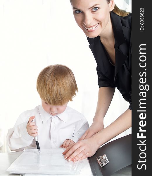 The beautiful businesswoman in a black jacket and boy. The beautiful businesswoman in a black jacket and boy