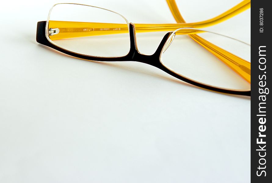 Modern eyeglasses with clear lenses come in a variety of fun colours. Modern eyeglasses with clear lenses come in a variety of fun colours