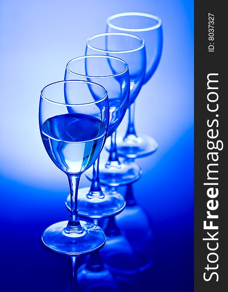 Blue Glass , Coolness Drink, Blue Backgroubd. Blue Glass , Coolness Drink, Blue Backgroubd