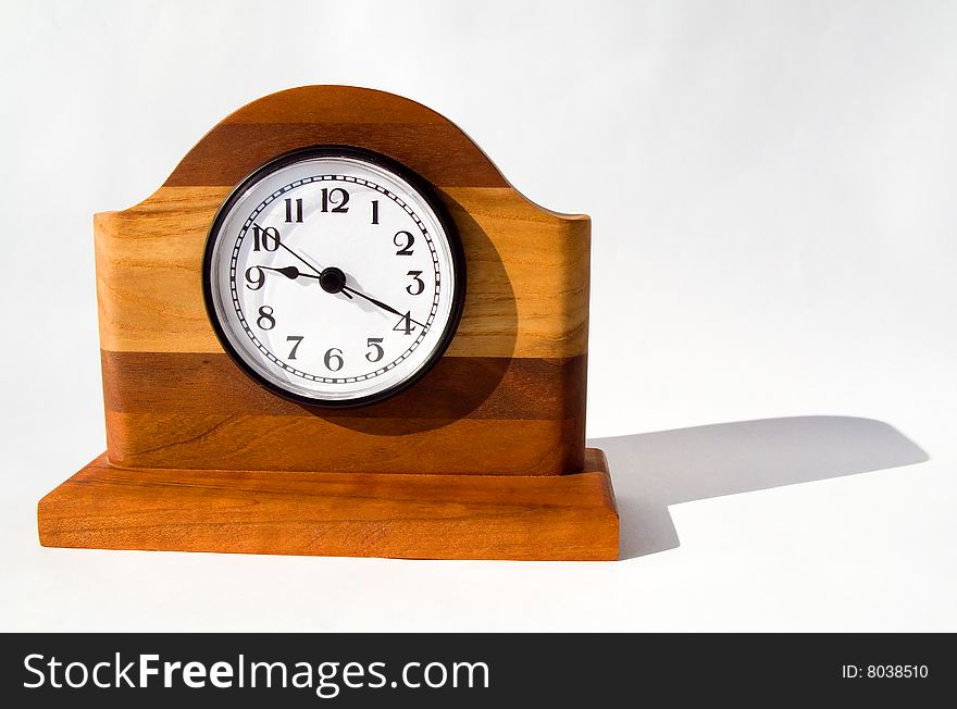 Wooden clock with multi colors of wood.
Created by a craftsman on white background. Wooden clock with multi colors of wood.
Created by a craftsman on white background.