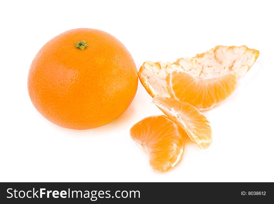 Tangerine and segments on white