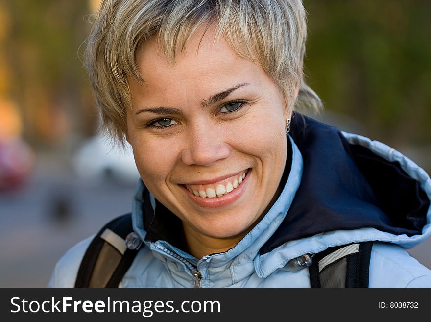 Blond woman. Smiling. Model Natalia Kaygorodova. Summer 2008.