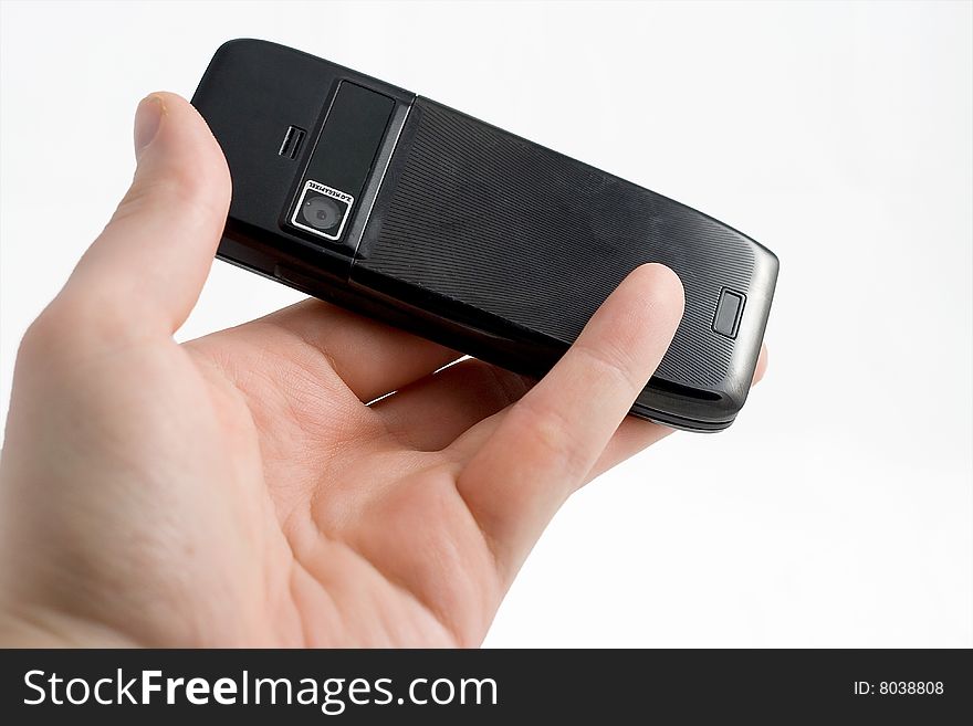 Hand playing mobile phone on white background. Isolated.