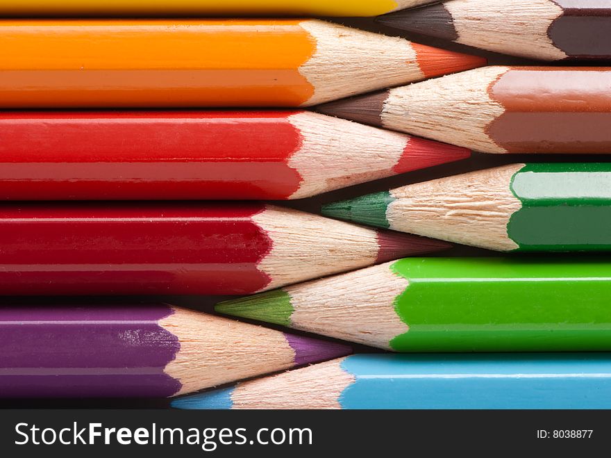 Wooden colored pencils, closeup image