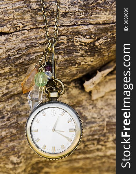 Vintage watch over wood background. Vintage watch over wood background.