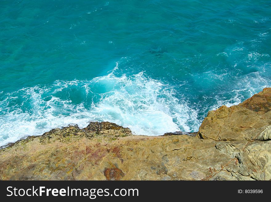 Waves crashing against the rocks