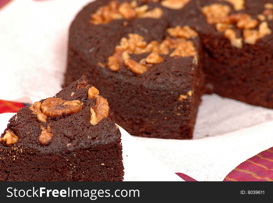 Fresh baked chocolate cake with almonds. Fresh baked chocolate cake with almonds