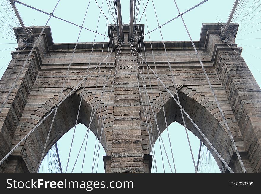 Brooklyn bridge close up  with blue background in new york. Brooklyn bridge close up  with blue background in new york
