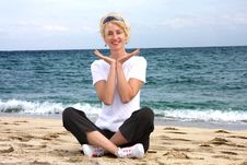 Girl Meditating By The Sea Stock Photo Girl Meditating By The Sea Stock Photo