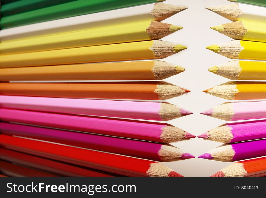 Sharp color pencils on a white background. Sharp color pencils on a white background