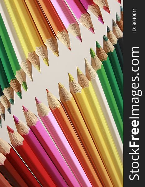 Sharp color pencils on a white background. Sharp color pencils on a white background