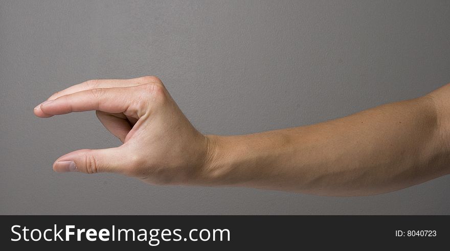 C shape hand gesture sign also look alike a shape of bird beak