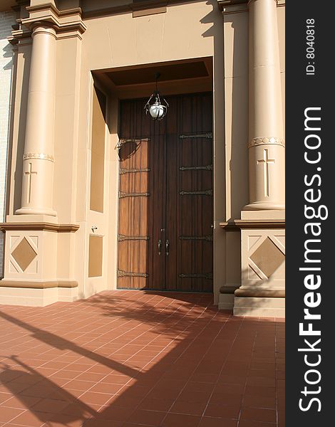 Elaborate church entry with beautiful ornate wooden doors. Elaborate church entry with beautiful ornate wooden doors.