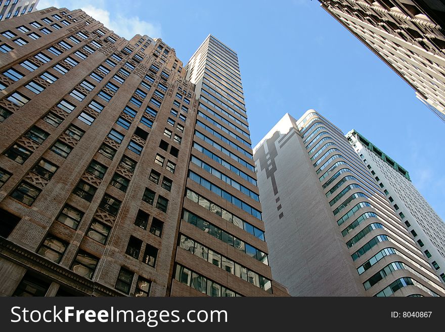 Picture of different office buildings and a blue sky. Picture of different office buildings and a blue sky