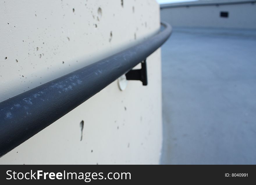 Closeup handrail along the wall with details