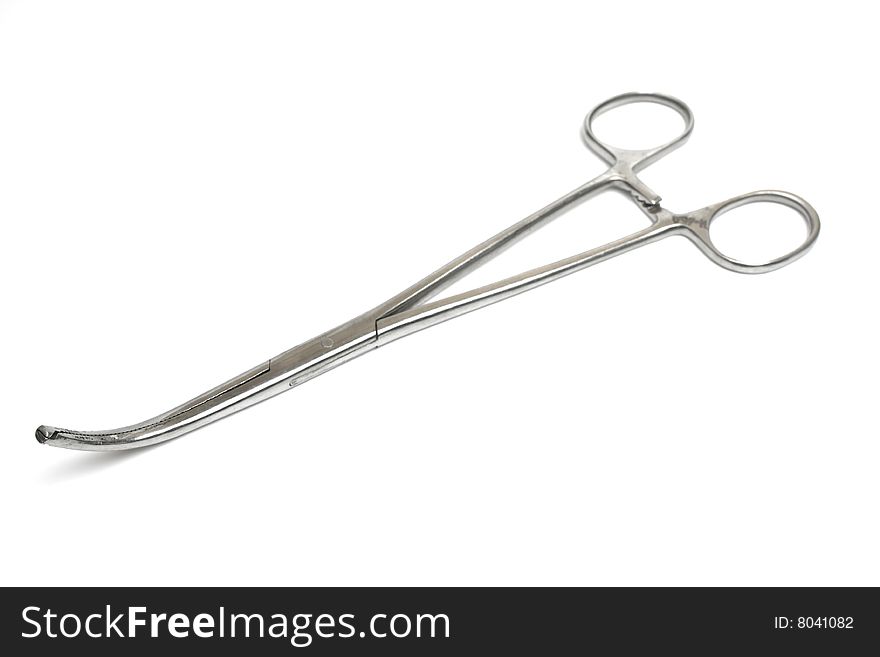 Closed metall surgical clip on white isolated