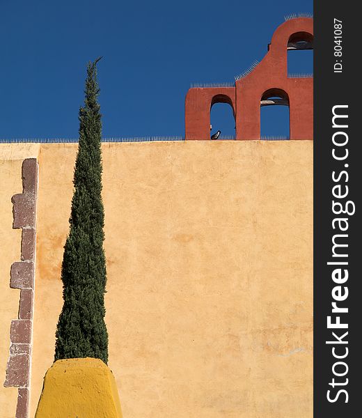 Detail of grounds of Templo de la Inmaculada Concepcion, San Miguel de Allende, Mexico, showing old bell tower