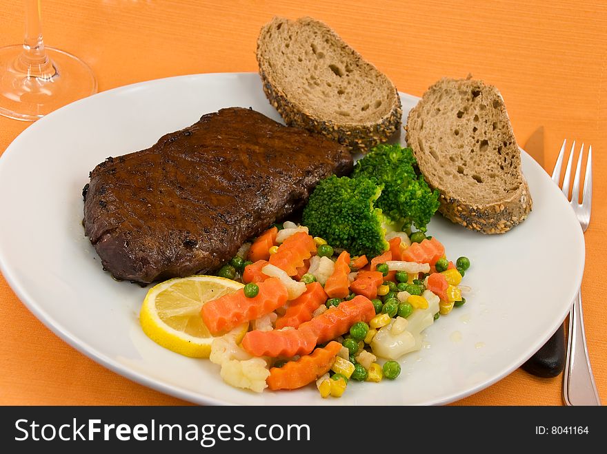 Roast Beef with green Beans and red potatoes.
new york strip steak.