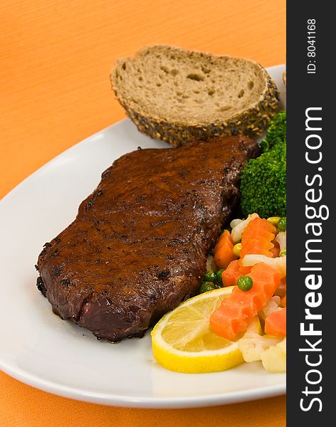 Roast Beef with green peas,broccoli,carrot. New York Strip Steak.