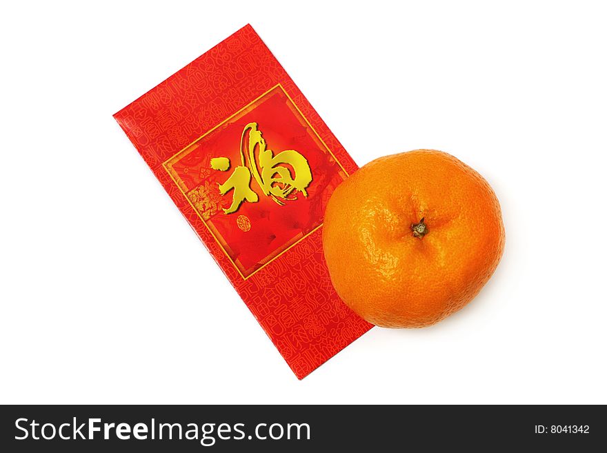 Mandarin orange and red packet isolated over white background.