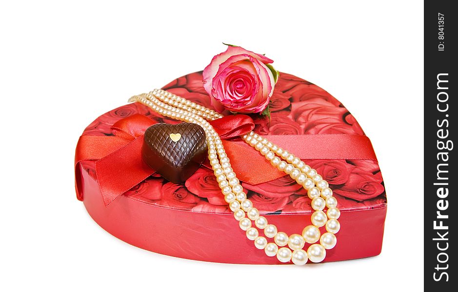 Vintage Valentine - rose and pearls with heart chocolate isolated on white. Vintage Valentine - rose and pearls with heart chocolate isolated on white