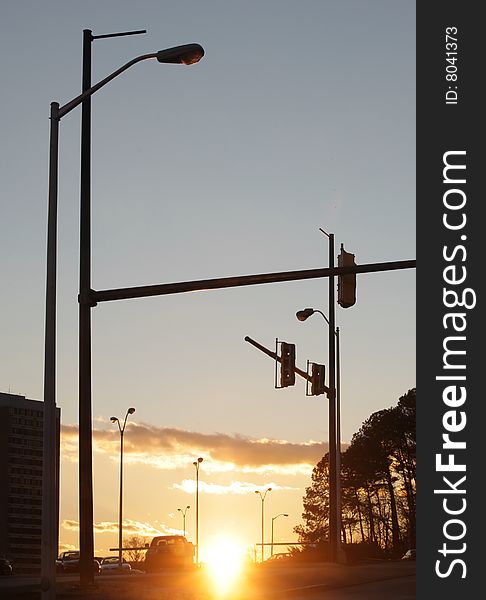 Silhouette of traffic lamps at sunset. Silhouette of traffic lamps at sunset