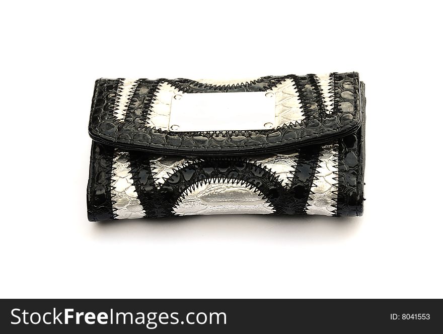 Shot of a black and silver purse on white